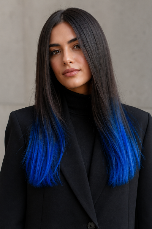 Blue balayage for brunettes featuring soft blended navy, teal, and pastel tones on long layered hair with natural dark roots and glossy finish