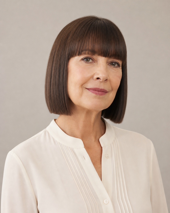 Layered bob with bangs for women over 50 showcasing flattering, modern styles for different face shapes and hair textures
